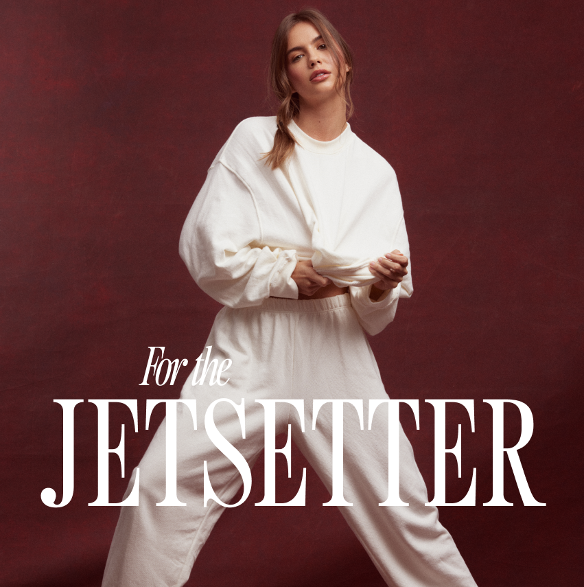 MODEL WEARS BLANC LIGHTWEIGHT SWEATS FOR THE JETSETTER GIFT GUIDE HEADER.