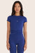 Model wears BREATHE TEE in AQUA <model-info>Reese wears a size XS and is 5’8”, 23½” waist, 31” bust.</model-info>