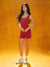 Woman wearing a red unitard against an orange background