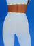 Light blue leggings with a striped waistband and gold accents on a blue background