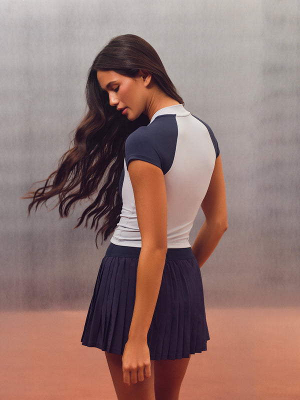 AERALINE™ BREATHE CONTRAST ZIP TEE - BIRDIE