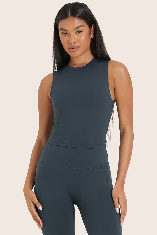 MODEL WEARS AIRLUXE™ BREATHE LEAN BRA IN COMPASS 