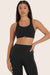 MODEL WEARS BREATHE FLEX BRA IN ONYX 