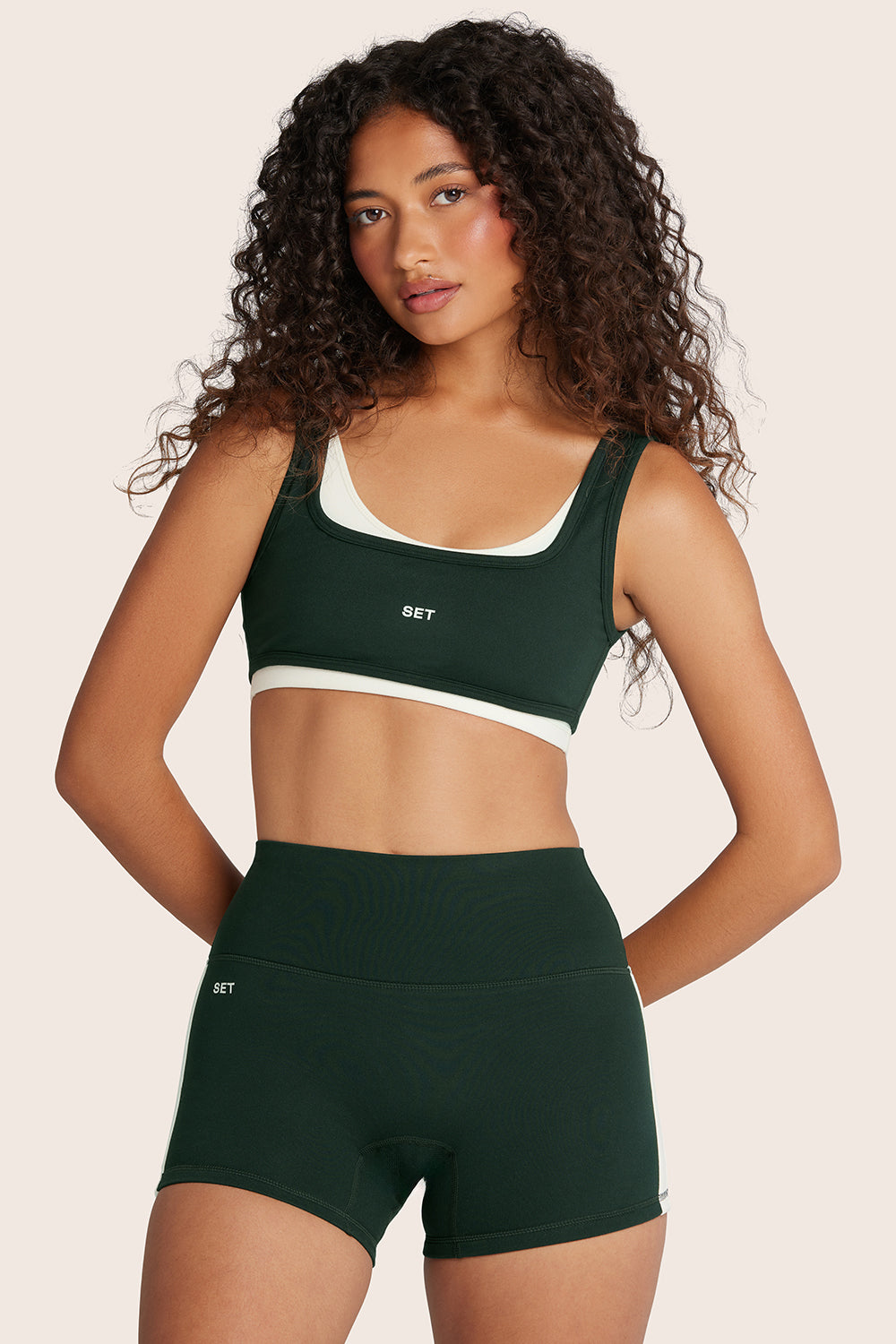 MODEL WEARS FORMCLOUD® CLOUD COURSE BRA IN ACRE 