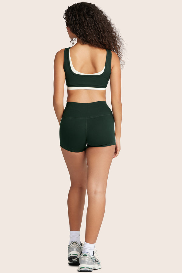 MODEL WEARS FORMCLOUD® CLOUD LINE SHORTS IN ACRE 