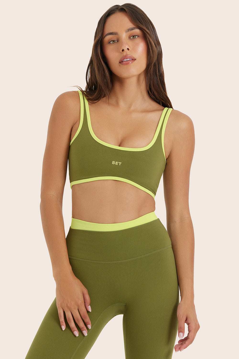 Model wears FORMCLOUD® CLOUD CONTRAST RISE BRA in MARGARITA 