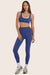 Model wears BREATHE HIGH-RISE LEGGINGS in BETTA 