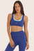 Model wears BREATHE LAYER SCOOP BRA in BETTA <model-info>Reese wears a size XS and is 5’8", 23.5" waist, 31" bust.</model-info>