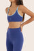 Model wears BREATHE CONTRAST MOVE BRA in BETTA 