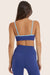 Model wears BREATHE CONTRAST MOVE BRA in BETTA 