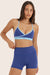 Model wears BREATHE PIPELINE BRA in BETTA 