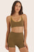 Model wears BREATHE CONTRAST MOVE BRA in OTTER <model-info>Reese wears a size XS and is 5’8", 23.5" waist, 31" bust.</model-info>