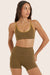 Model wears BREATHE CONTRAST MOVE BRA in OTTER 