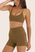 Model wears BREATHE CONTRAST MOVE BRA in OTTER 