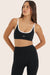 Model wears BREATHE CONTRAST MOVE BRA in ORCA 