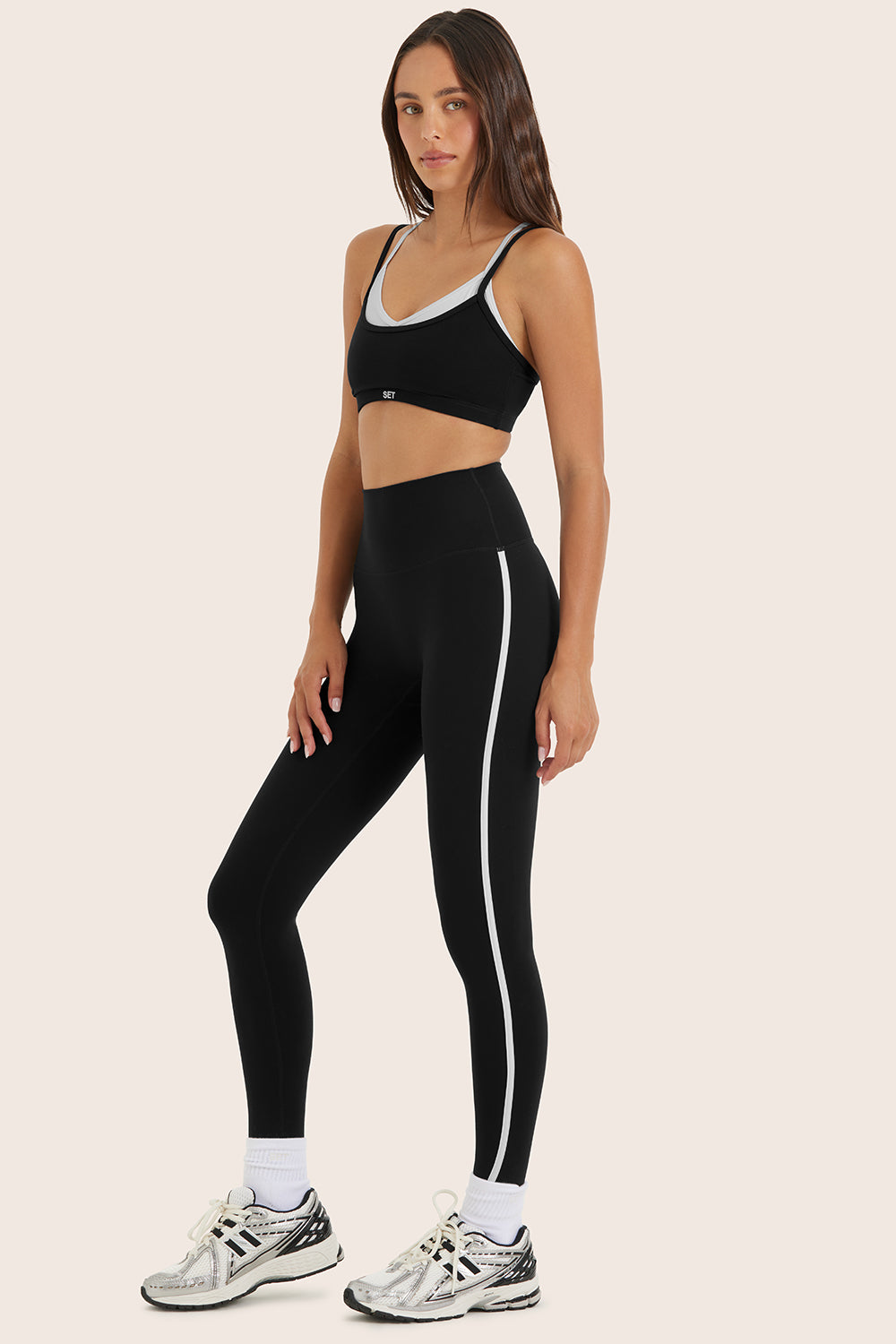 Model wears SPORTBODY® (BLOOPERS) SPORTY HIGH-RISE STRIPE LEGGINGS in ORCA 