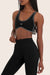 Model wears SPORTBODY® SPORTY STITCH BRA in ORCA 