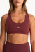 Maroon sports bra with 'SET' logo on a white background
