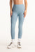 Light blue leggings worn by a person on a white background <model-info>Jasmine wears a size S and is 5’8”, 25" waist, 36” bust.</model-info>
