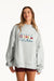 Woman wearing a gray sweatshirt with colorful text on a white background <model-info>Presley wears a size L/XL and is 5’6”, 26” waist, 33” bust.</model-info>