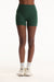 Green athletic shorts worn by a person on a white background <model-info>Autumn wears a size S and is 5’7½“, 25" waist, 32" bust.</model-info>