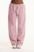 Pink sweatpants on a white background <model-info>Autumn wears a size S and is 5’7½”, 25” waist, 32” bust.</model-info>