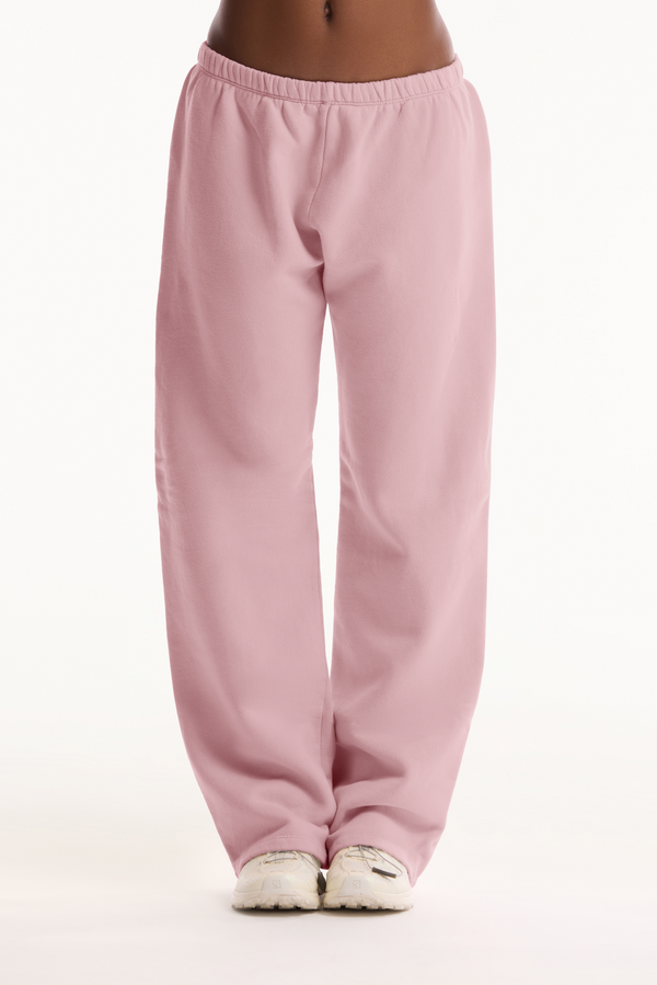 Pink sweatpants on a white background 