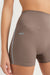 Brown athletic shorts with 'SET' logo on a white background