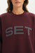 Maroon sweatshirt with 'SET Sport' logo on a plain background