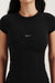 Black t-shirt with 'SET' logo worn by a person on a white background