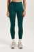 Person wearing teal leggings with a white background <model-info>Kenzie wears a size S and is 5’6, 25” waist, 33” bust.</model-info> 