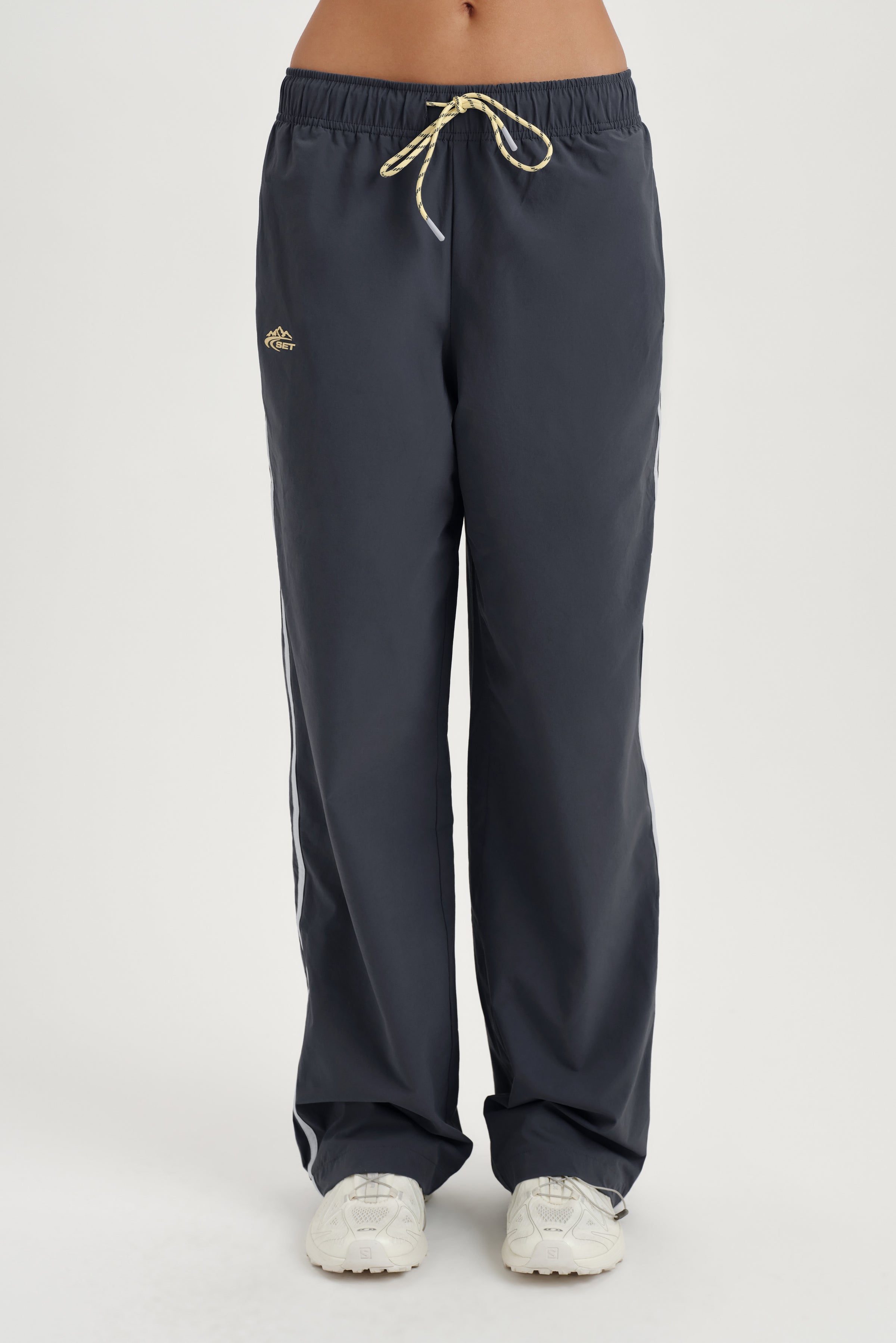 Gray track pants on a white background 