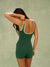 Person wearing a green swimsuit with white trim on a plain background <model-info>Jelene wears a size XS and is 5’7”, 23” waist, 32AB bust.</model-info>