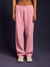 Front view of pink sweatpants with relaxed straight leg fit”