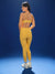 Woman wearing a yellow sports outfit on a blue background
