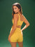 Woman wearing a yellow sports outfit against a green background