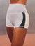 White high-waisted athletic shorts with a black side panel, shown on a model from the waist down against a neutral gray background. <model-info>Scha'leigh wears a size XS and is 5’8”, 24” waist, 32B bust.</model-info>