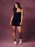A woman modeling a black sleeveless tank top and matching black shorts with zebra print, standing against a textured mauve studio backdrop. <model-info> Christina wears a size L and is 5’9, 29½” waist, 36" bust.</model-info> 
