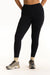 Person wearing black leggings on a white background <model-info>Jade wears a size L and is 5’9”, 30” waist, 38” bust.</model-info>