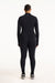 Person wearing a black full-body suit on a white background