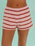 Pink and brown striped shorts on a light blue background <model-info>Kushi wears a size XS and is 5'8, 24” waist, 32C bust.</model-info>