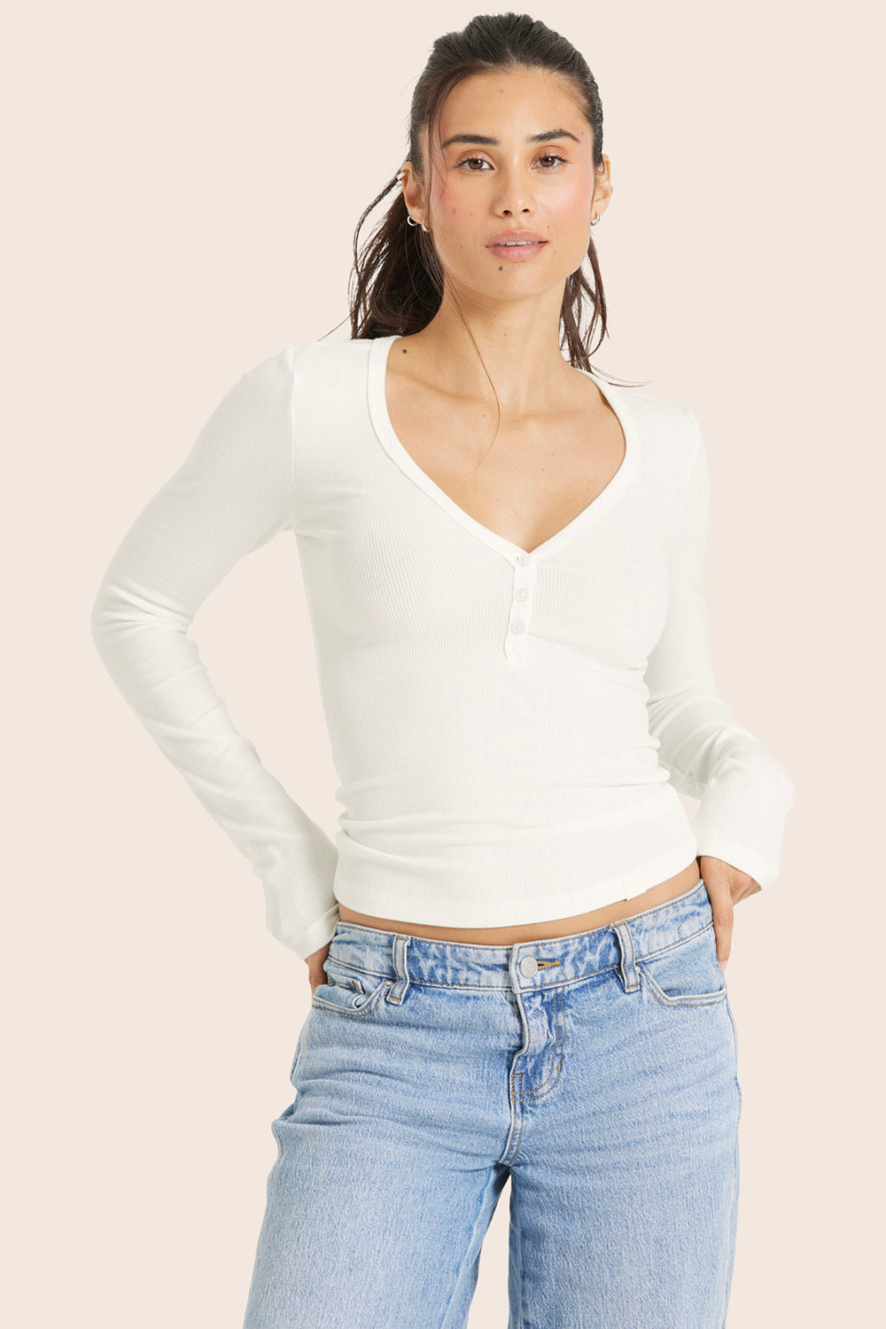 MODEL WEARS RIBBED MODAL BODY HENLEY IN BLANC