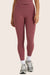 MODEL WEARS BREATHE HIGH-RISE LEGGINGS IN CANYON <model-info>Maiel wears a size M and is 5’9", 24" waist, 33" bust.</model-info>