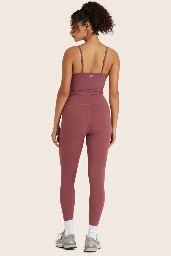 MODEL WEARS BREATHE HIGH-RISE LEGGINGS IN CANYON 