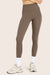 MODEL WEARS BREATHE LEGGINGS IN TRUFFLE <model-info>Kaya wears a size XS and is 5’10", 24" waist, 32.5" bust, 34A bra.</model-info>