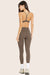 MODEL WEARS BREATHE LEGGINGS IN TRUFFLE 