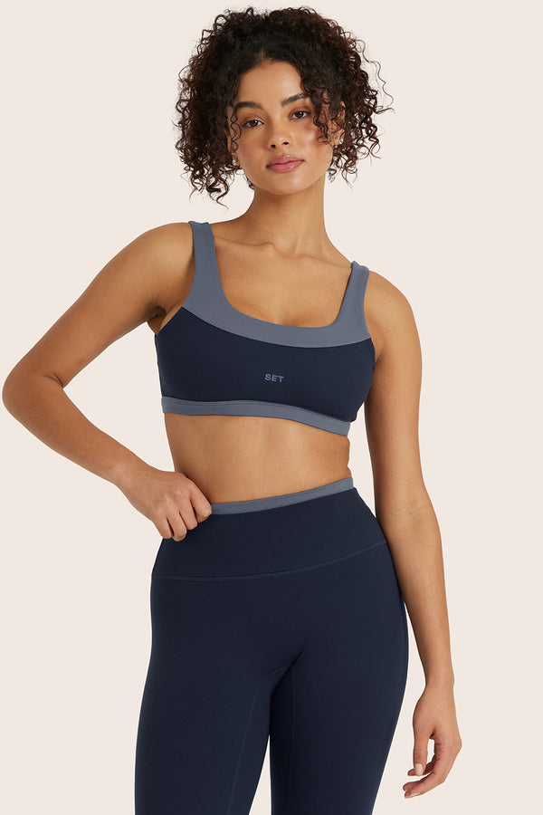 MODEL WEARS FORMCLOUD® CLOUD FORM BRA IN HARBOR 