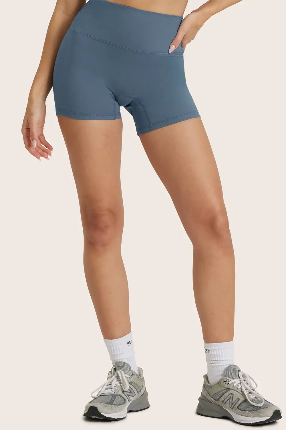 MODEL WEARS FORMCLOUD® CLOUD SHORTS IN HYDRO