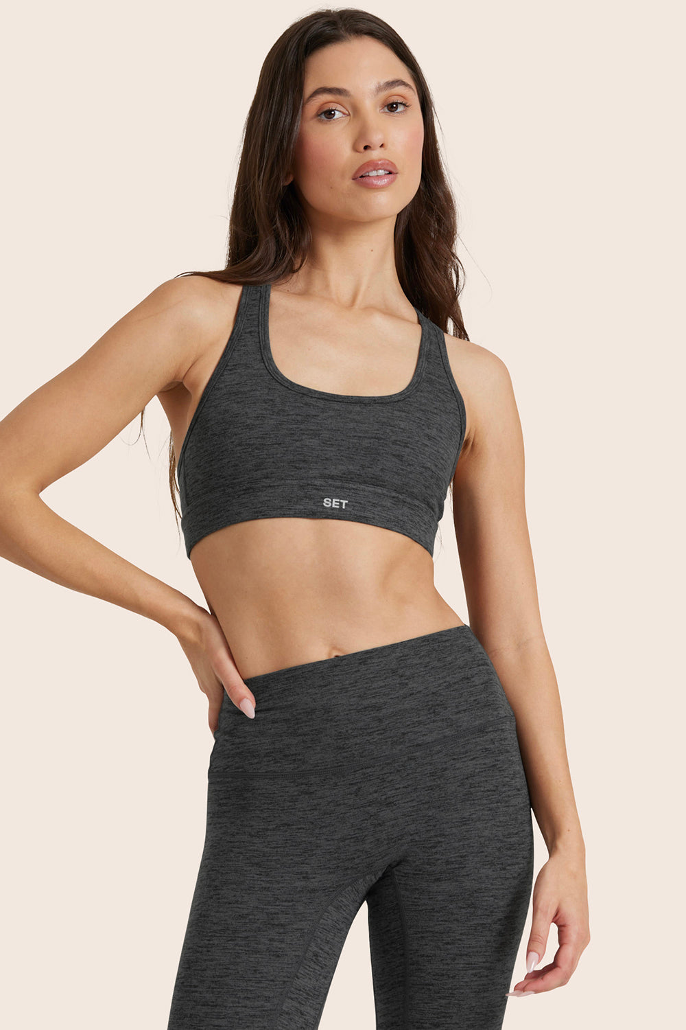 MODEL WEARS FORMCLOUD® CLOUD STAPLE BRA IN PEPPER HEATHER GREY 