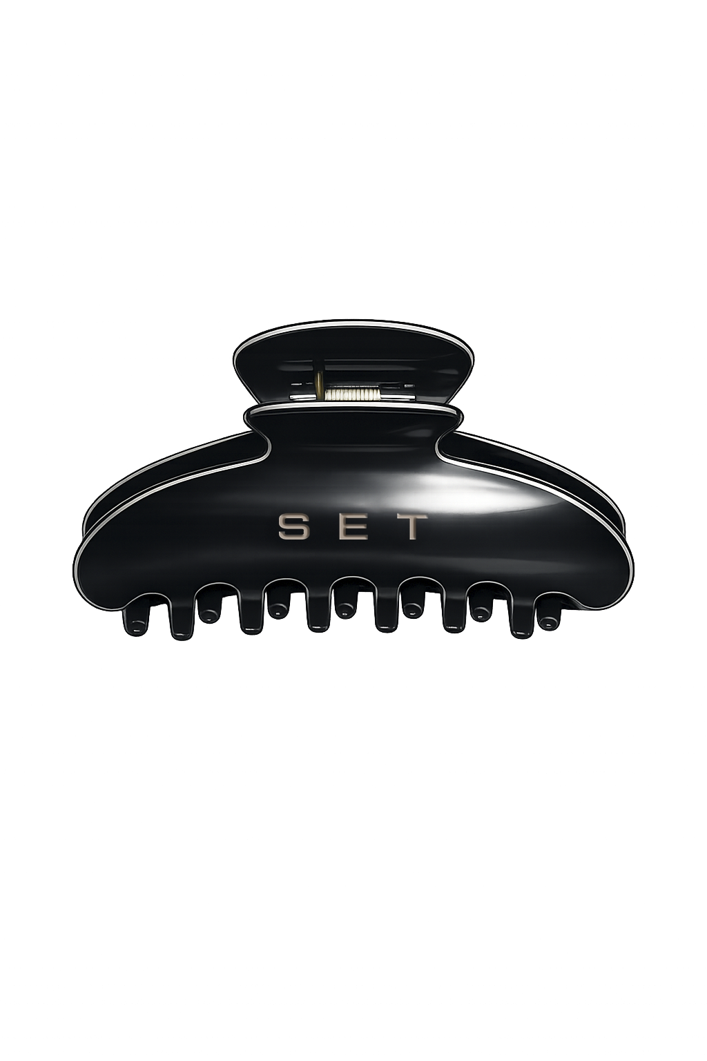 A glossy black hair claw clip with the brand name 'SET' in gold lettering on the front, shown against a solid white background.